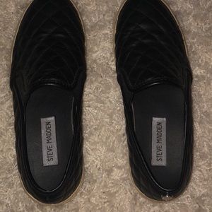 Black slip on Steve Madden sneakers